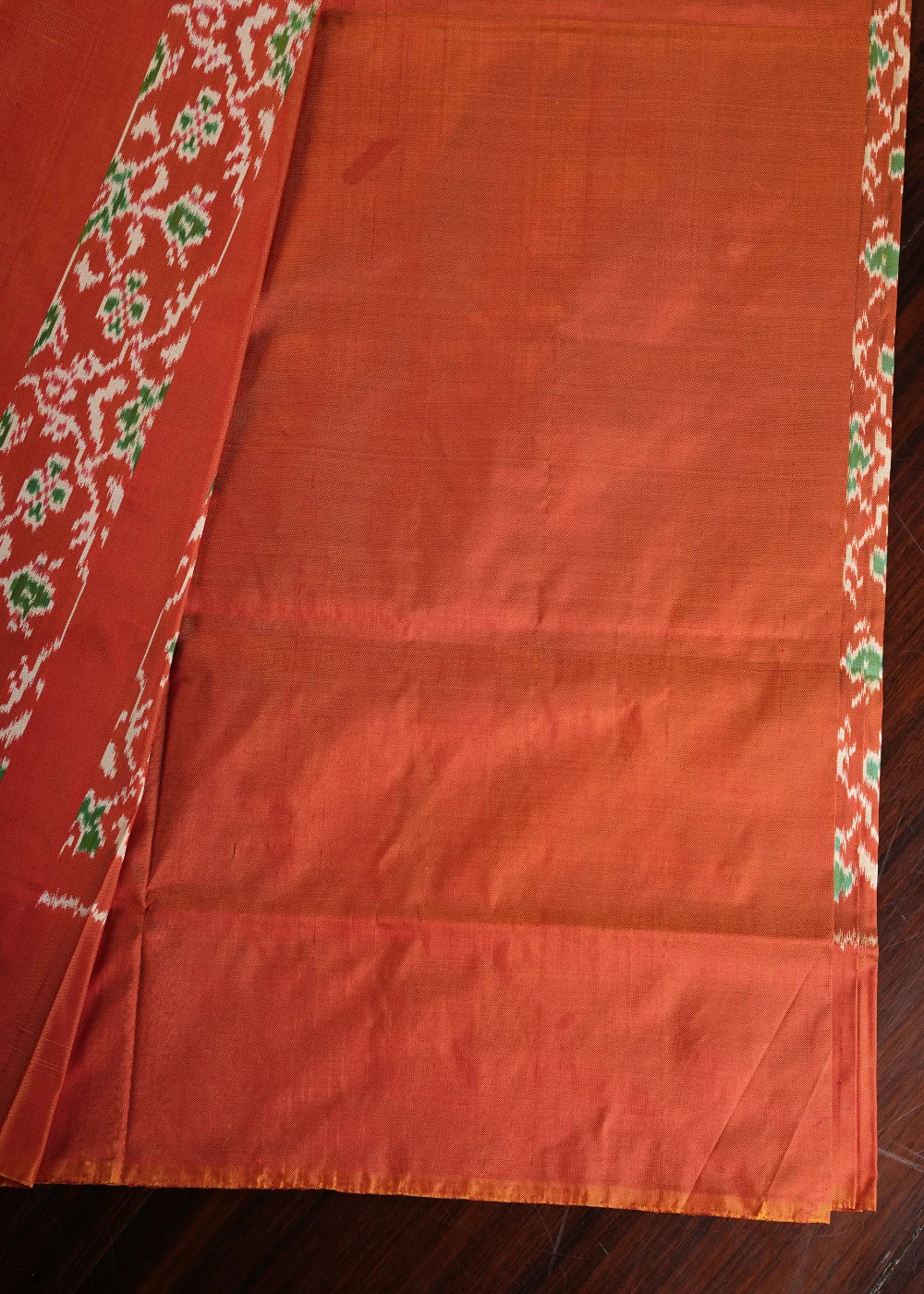 Dark Green Ikkat Silk Saree with Red Accents