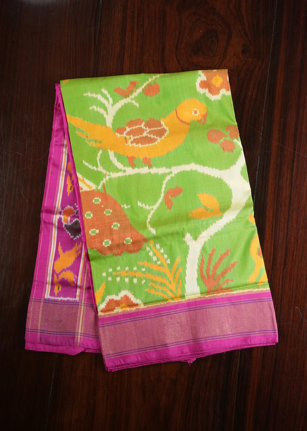 Parrot Green Ikkat Silk Saree with Pink Border