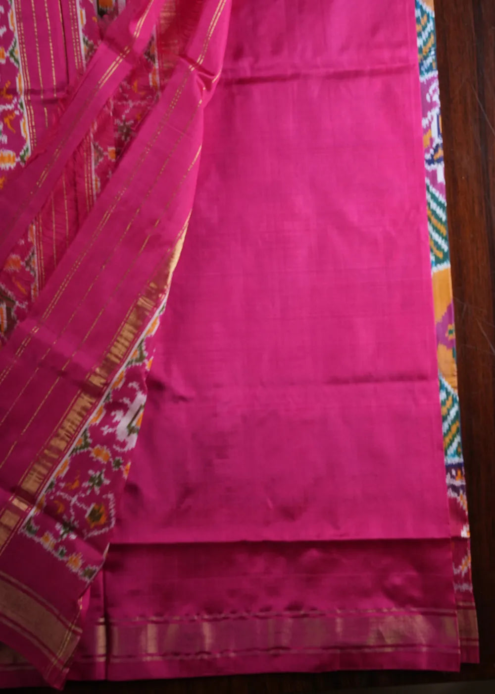 Magenta Ikkat Silk Saree with Multicolor Patterns