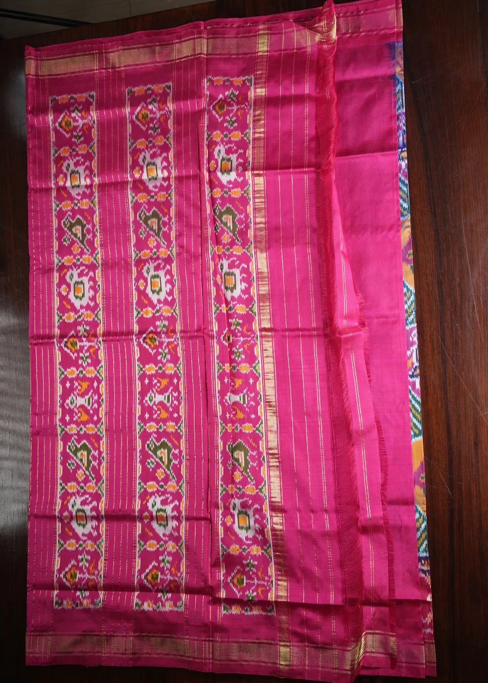 Magenta Ikkat Silk Saree with Multicolor Patterns