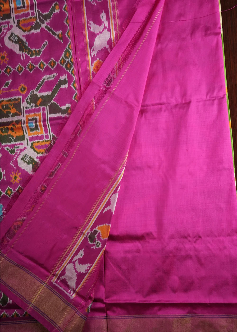 Parrot Green Ikkat Silk Saree with Pink Border