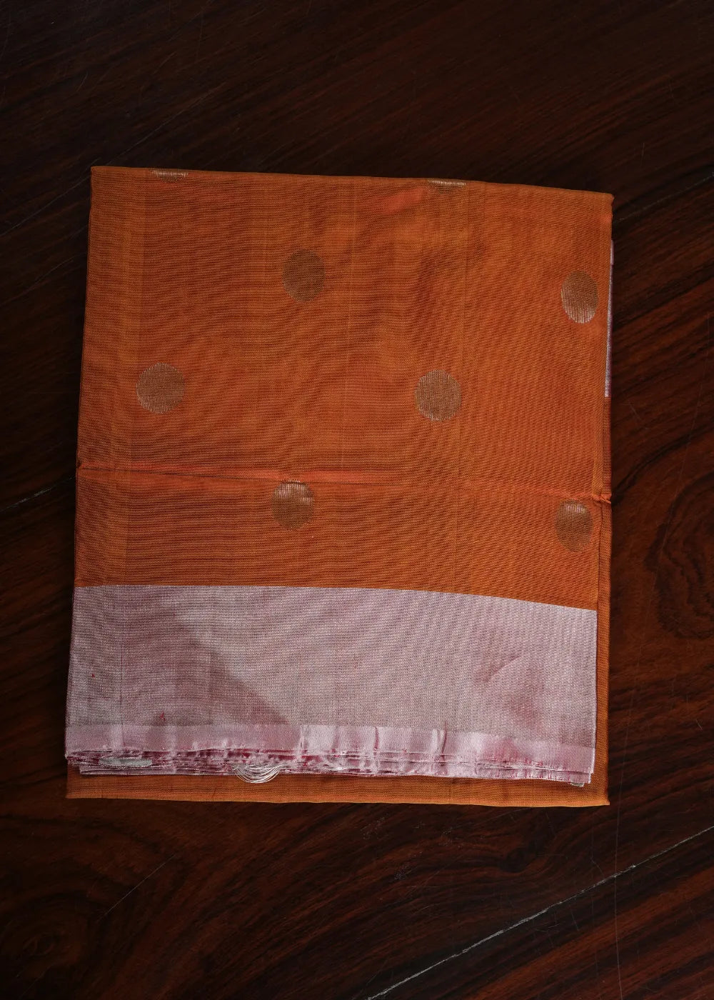 Rust Uppada Silk Saree with Dollar Bhutta and Silver Border