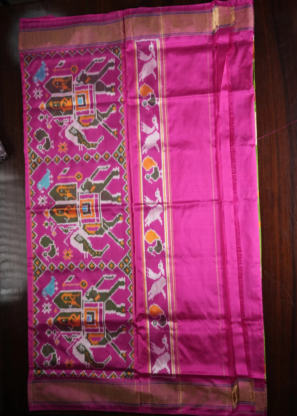 Parrot Green Ikkat Silk Saree with Pink Border