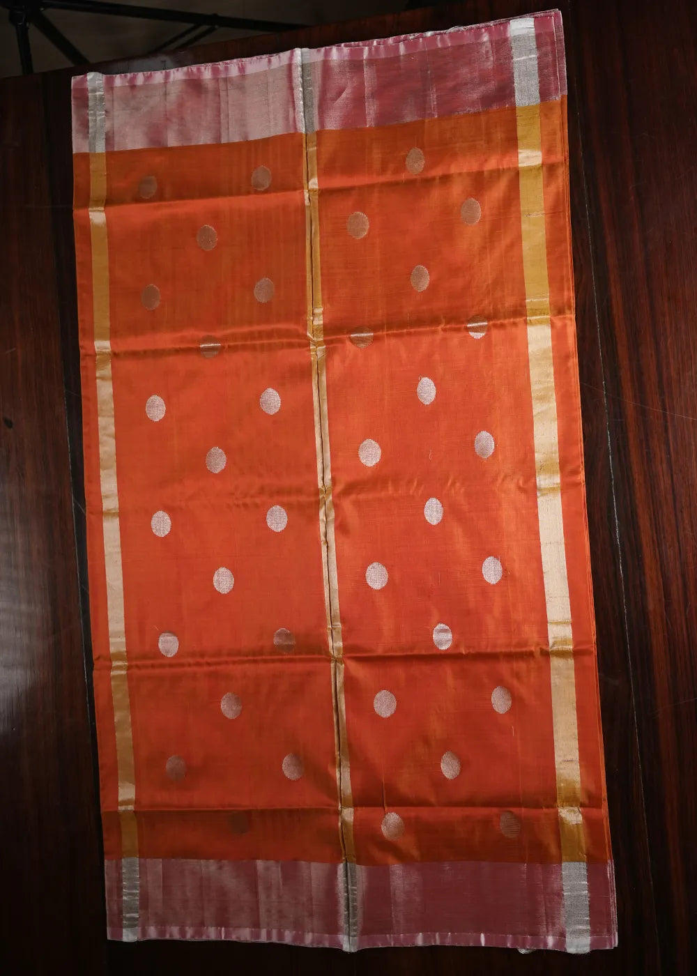 Rust Uppada Silk Saree with Dollar Bhutta and Silver Border