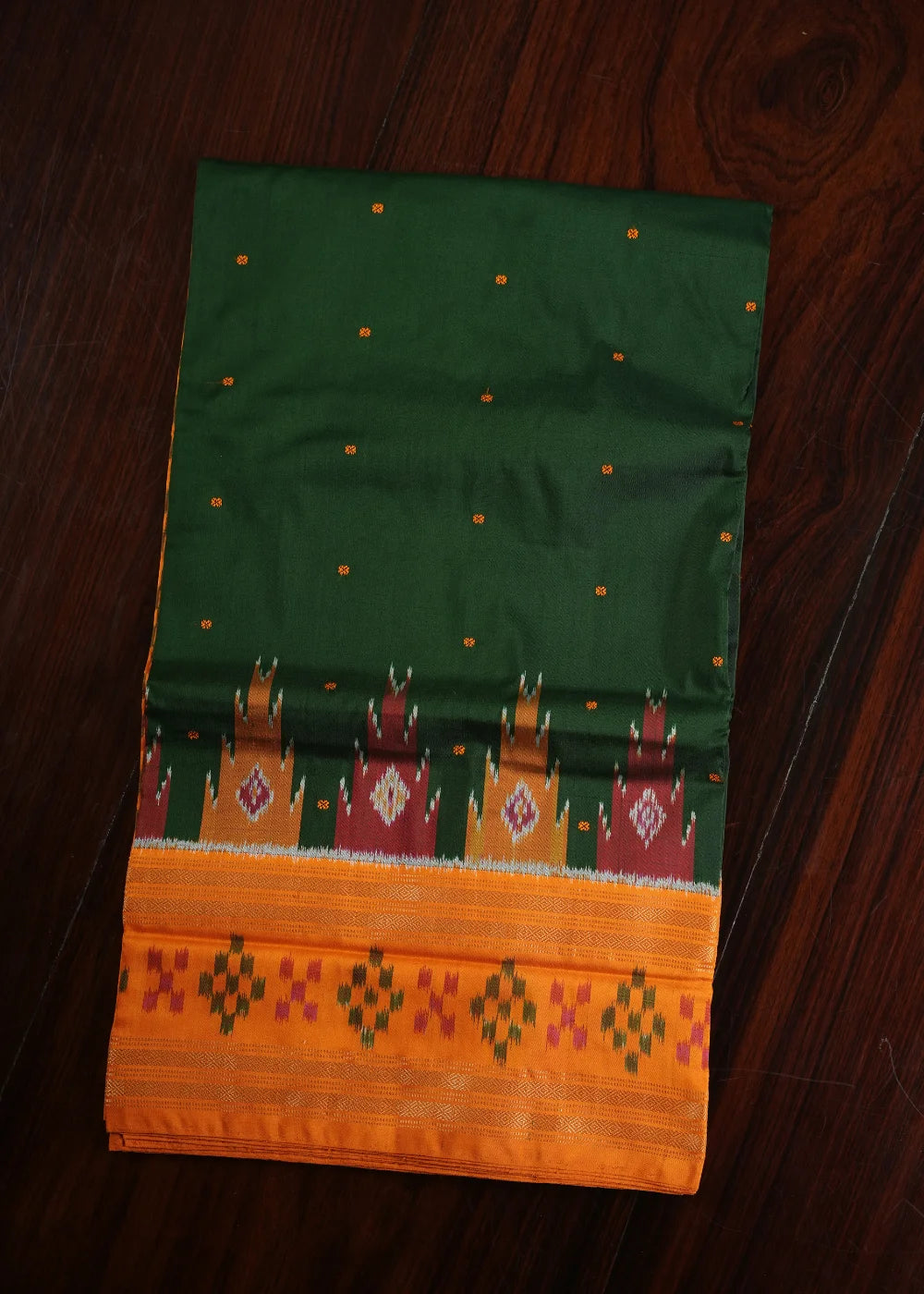 Dark Green Ikkat Silk Saree with Orange Accents