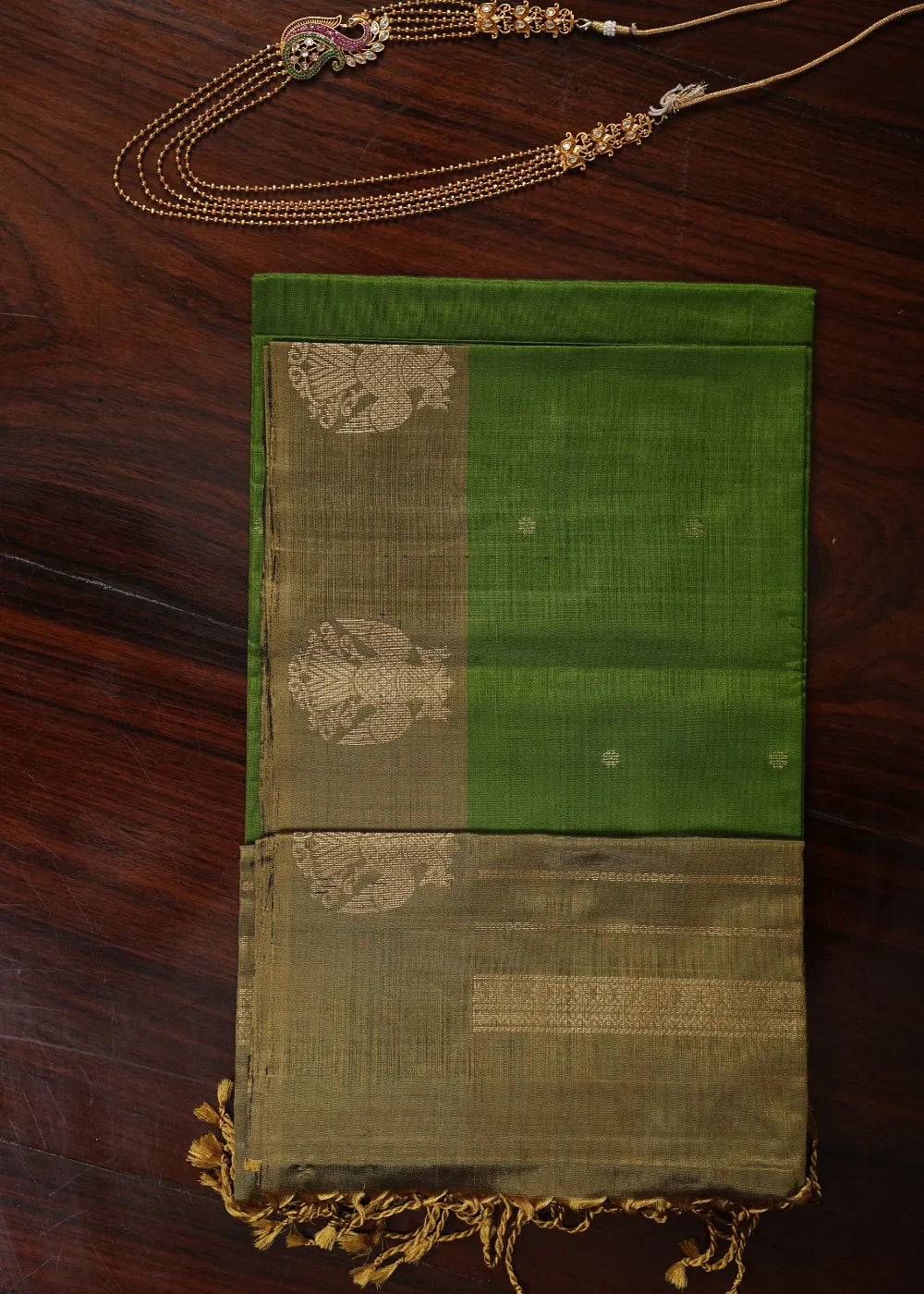 Olive Green Soft Silk Saree with Gandaberundam Border